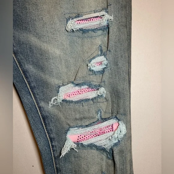 Denim jeans with pink rhinestones